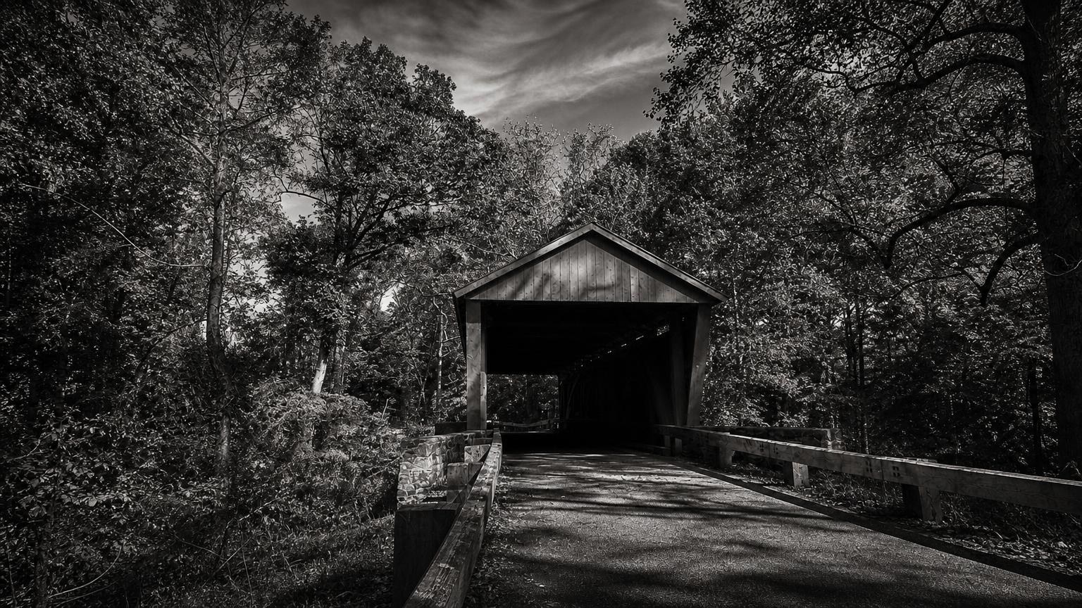 Monochrome editorial rendering of Jericho Covered Bridge's timber entrance and stone approaches.