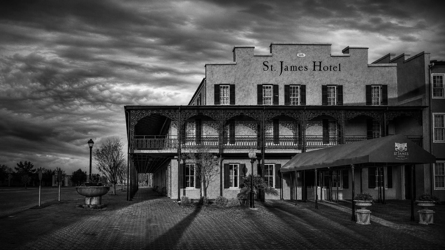 Monochrome editorial rendering of St. James Hotel's brick exterior.