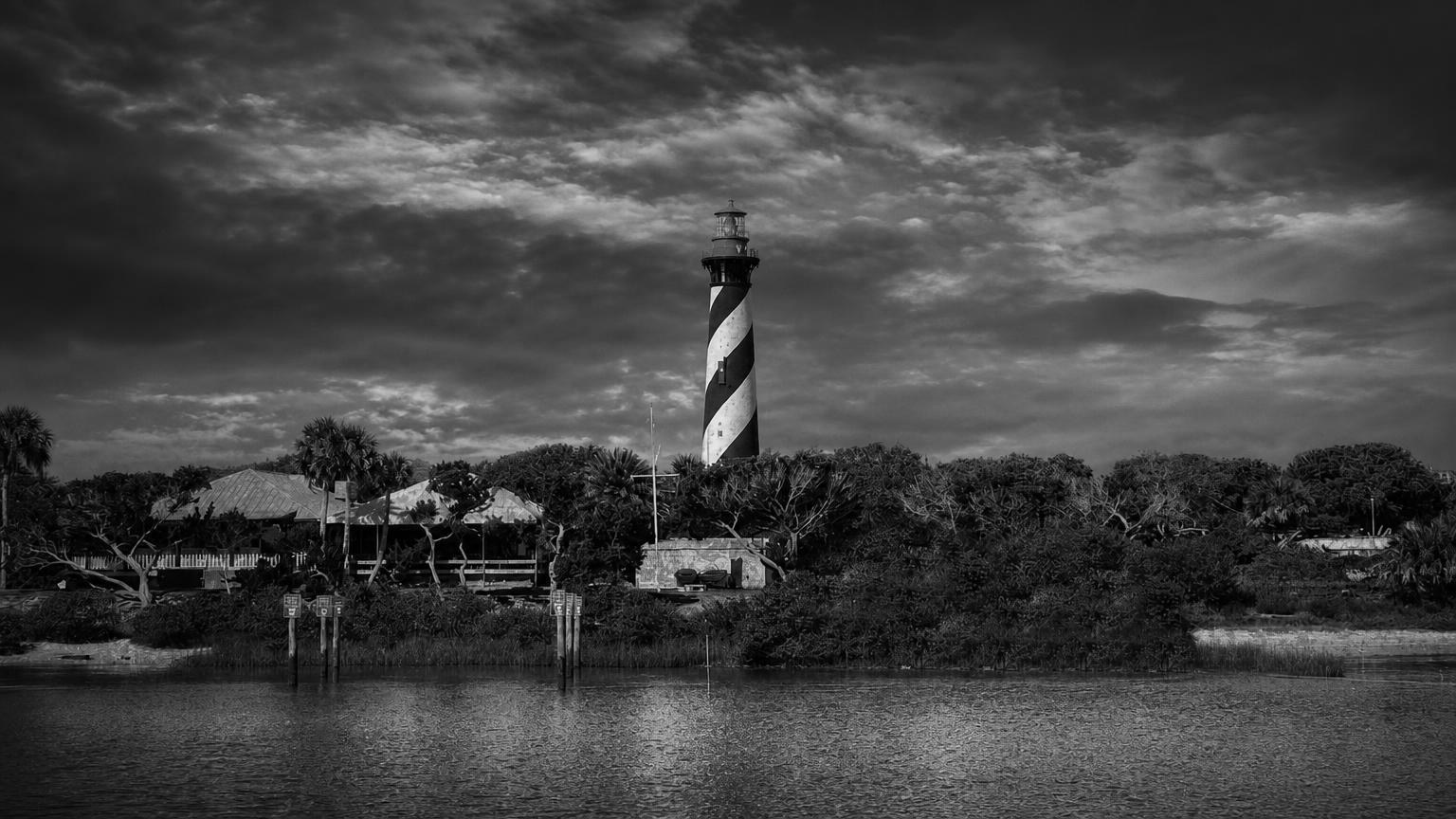 Monochrome editorial rendering of the striped St. Augustine Lighthouse.