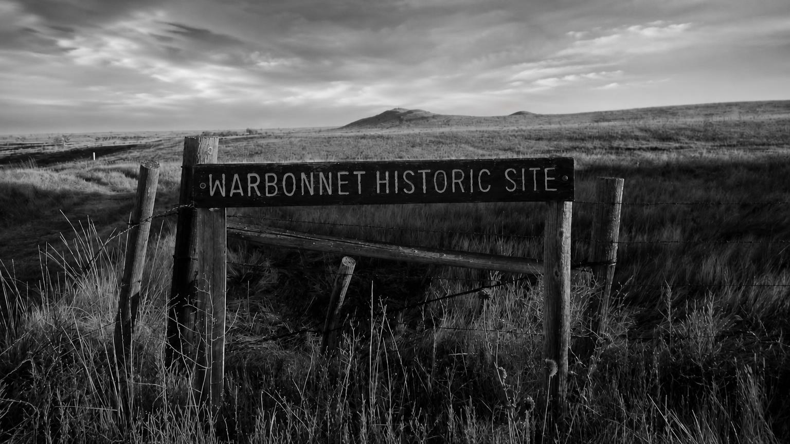 Monochrome editorial rendering of Warbonnet Battlefield Monument, Nebraska.