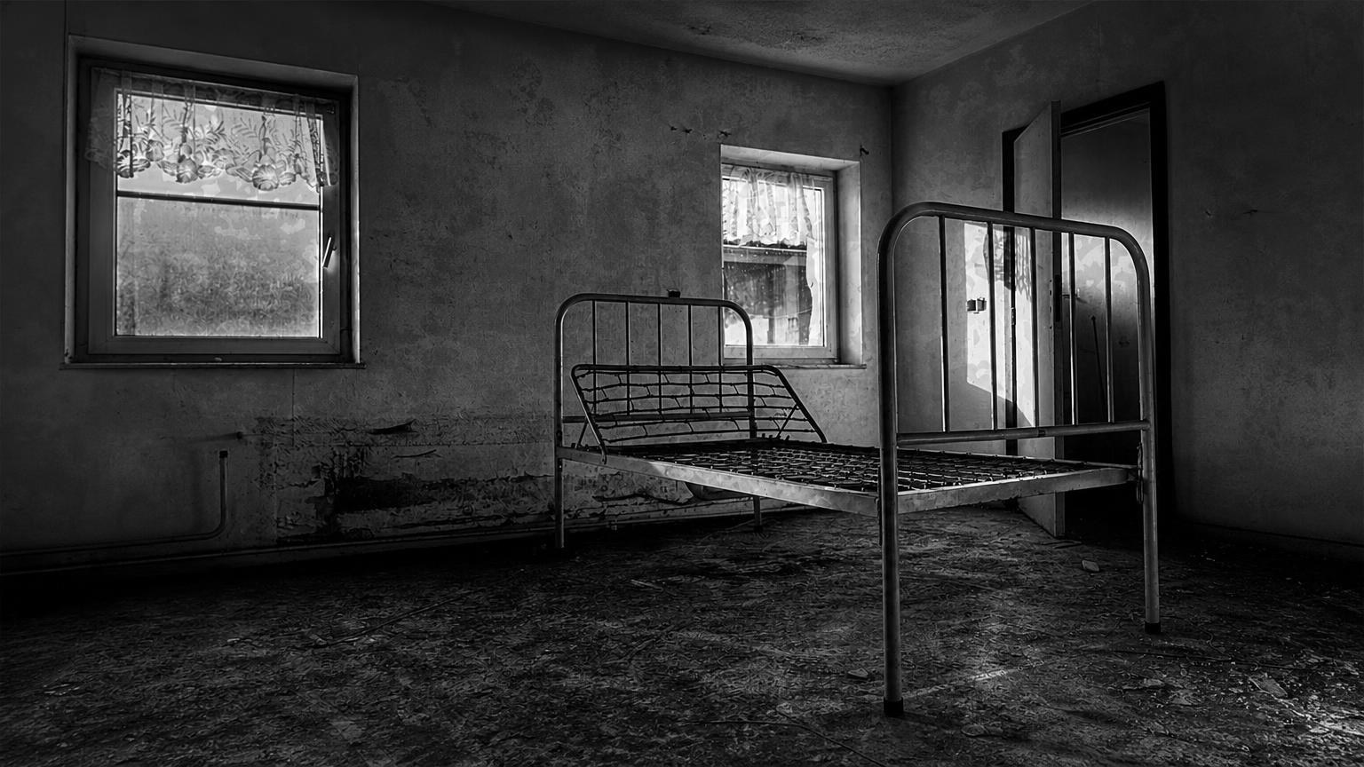 Monochrome editorial rendering of Kalamazoo Sanitarium in Michigan.