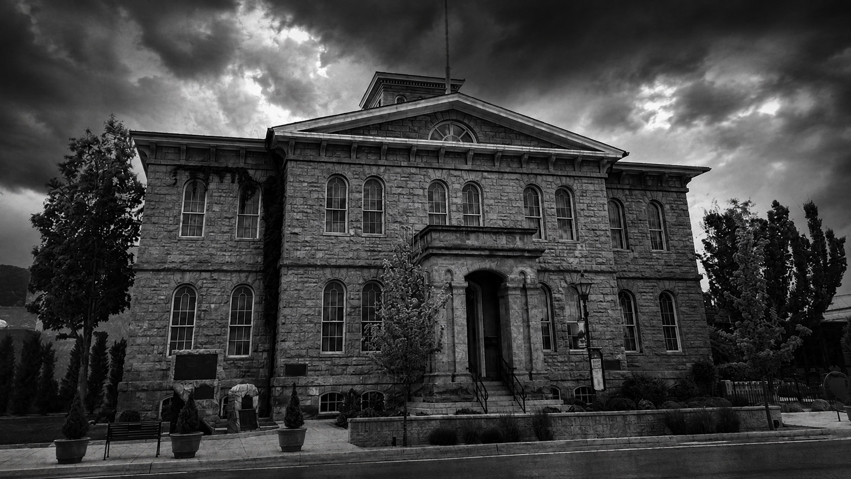 Monochrome editorial rendering of the historic Carson City Mint exterior.