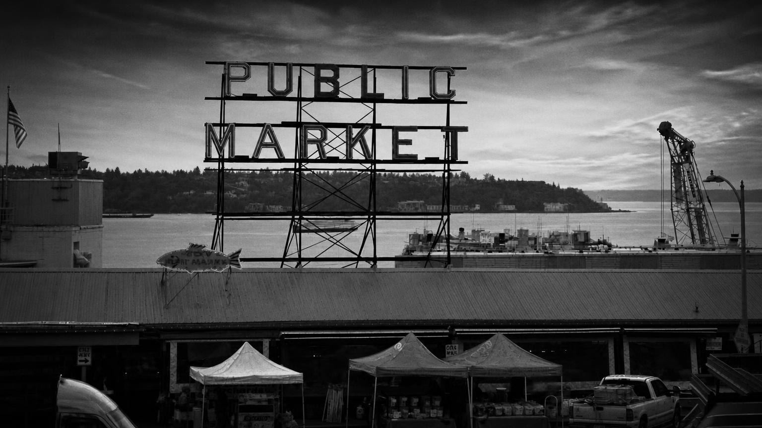 Monochrome editorial rendering of the Public Market sign at Pike Place Market.